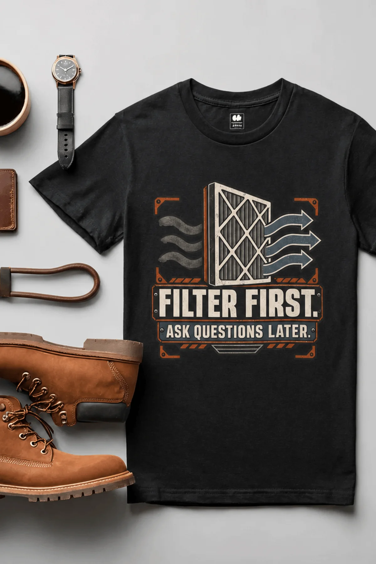 T-Shirt — "Filter First. Ask Questions Later." HVAC Air Filter Graphic — black t-shirt, flat-lay product photo | Pressure Tested Co