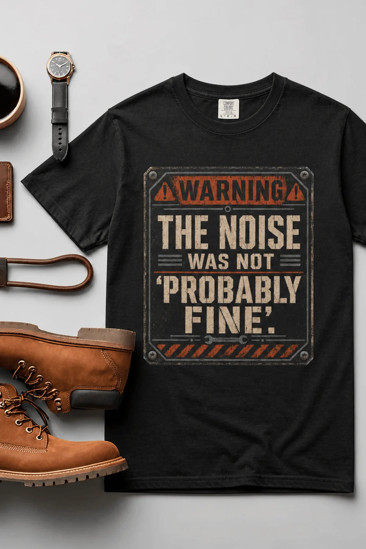 Warning Sign T-Shirt — "The Noise Was Not 'Probably Fine'" Vintage Graphic Tee — black t-shirt, flat-lay product photo | Pressure Tested Co