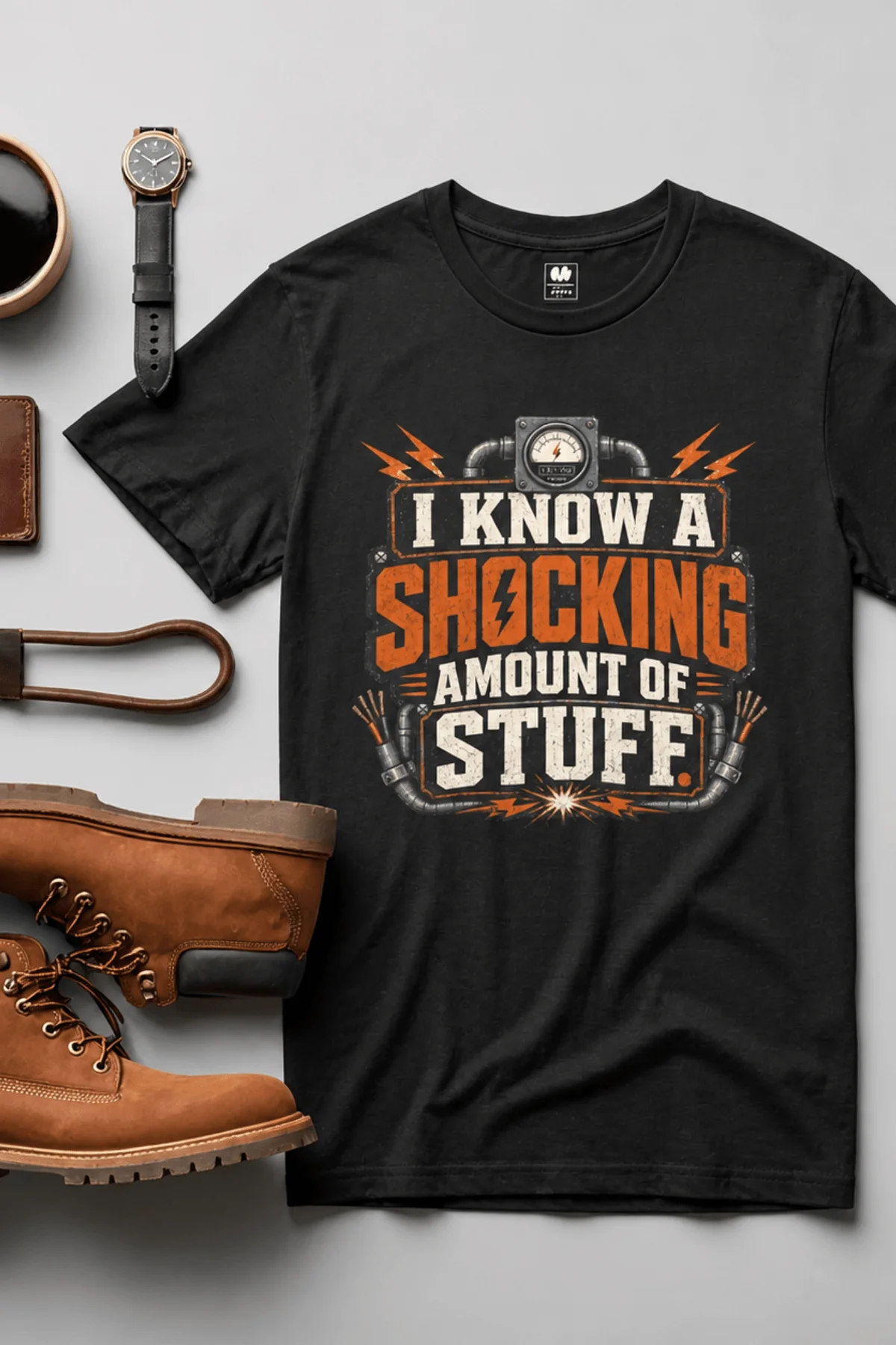 I Know A Shocking Amount Of Stuff T-Shirt — Electrician Science Humorous Tee — black t-shirt, flat-lay product photo | Pressure Tested Co