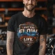 'I Put The Flow Back Into Your Life.' T-Shirt — Funny Retro Industrial Plumber's Tee — black t-shirt, model photo | Pressure Tested Co