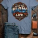 'I Put The Flow Back Into Your Life.' T-Shirt — Funny Retro Industrial Plumber's Tee — blue-jean t-shirt, flat-lay product photo | Pressure Tested Co