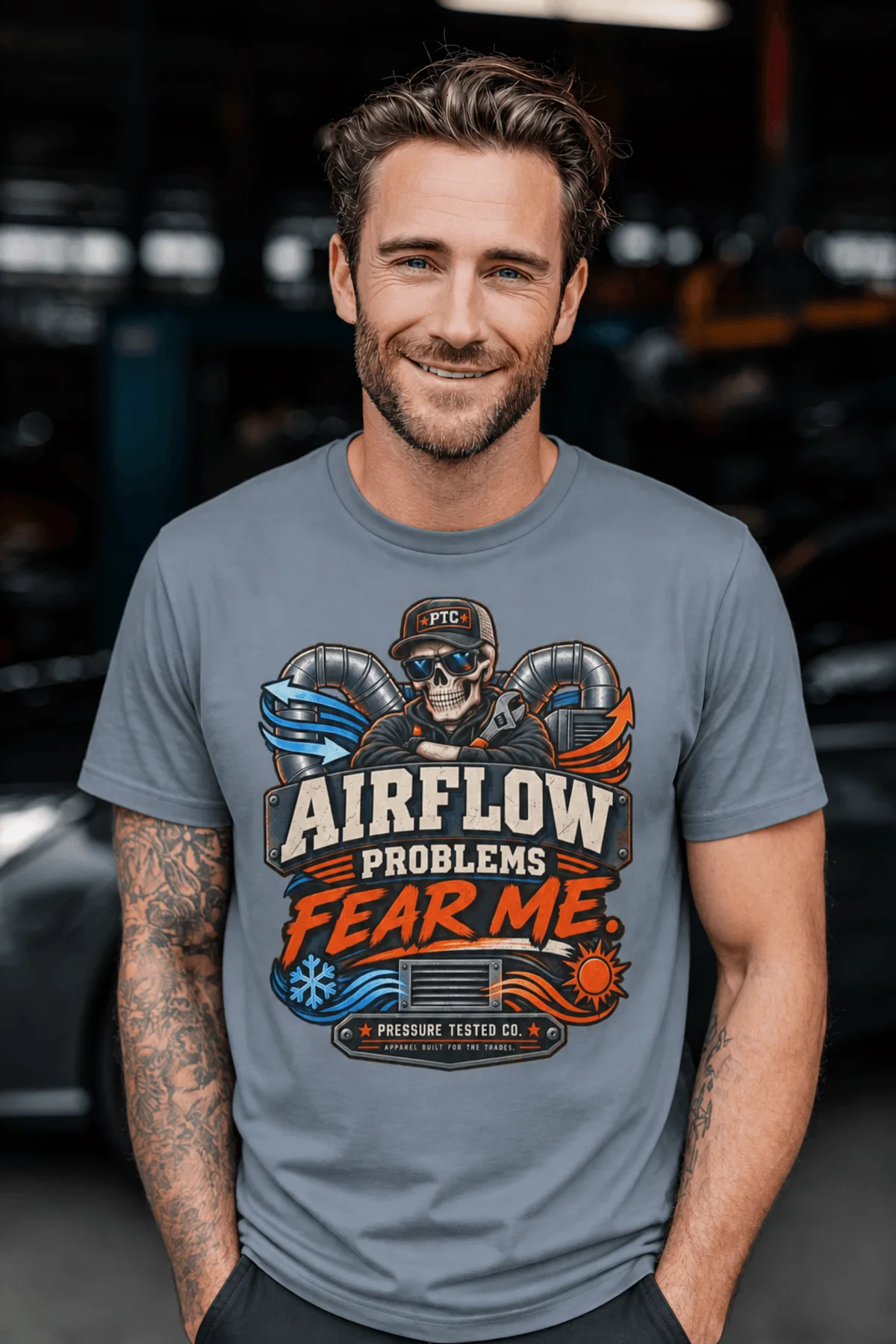 Airflow Problems Fear Me T-Shirt — HVAC Technician Skull Logo Tee — blue-jean t-shirt, model photo | Pressure Tested Co