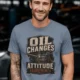 'Oil Changes and Attitude Adjustments' T-Shirt — Funny Retro Industrial Mechanic's Tee — blue-jean t-shirt, model photo | Pressure Tested Co