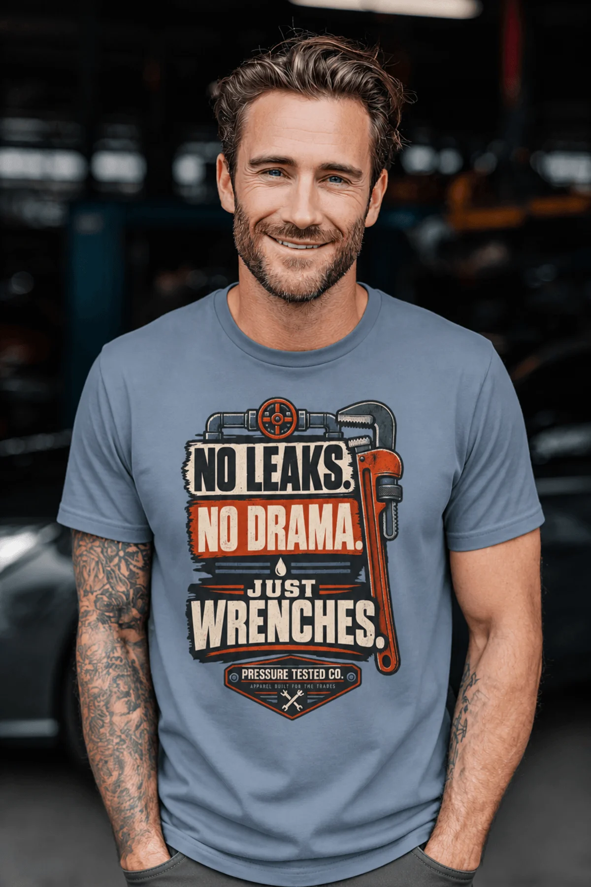 "No Leaks, No Drama, Just Wrenches" Vintage Plumbing Tee — blue-jean t-shirt, model photo | Pressure Tested Co