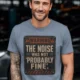 Warning Sign T-Shirt — "The Noise Was Not 'Probably Fine'" Vintage Graphic Tee — blue-jean t-shirt, model photo | Pressure Tested Co
