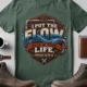 'I Put The Flow Back Into Your Life.' T-Shirt — Funny Retro Industrial Plumber's Tee — blue-spruce t-shirt, flat-lay product photo | Pressure Tested Co