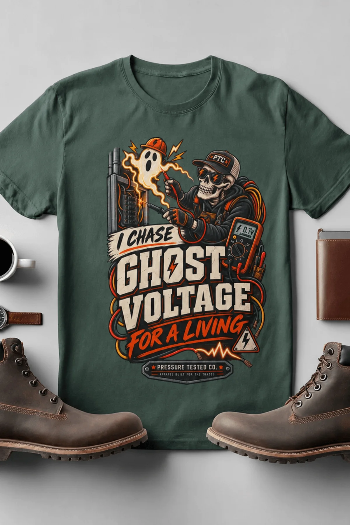 Ghost Voltage T-Shirt — 'I Chase Ghost Voltage for a Living' Vintage Electrician Tee — blue-spruce t-shirt, flat-lay product photo | Pressure Tested Co