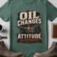 'Oil Changes and Attitude Adjustments' T-Shirt — Funny Retro Industrial Mechanic's Tee — blue-spruce t-shirt, flat-lay product photo | Pressure Tested Co