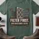 T-Shirt — "Filter First. Ask Questions Later." HVAC Air Filter Graphic — blue-spruce t-shirt, flat-lay product photo | Pressure Tested Co
