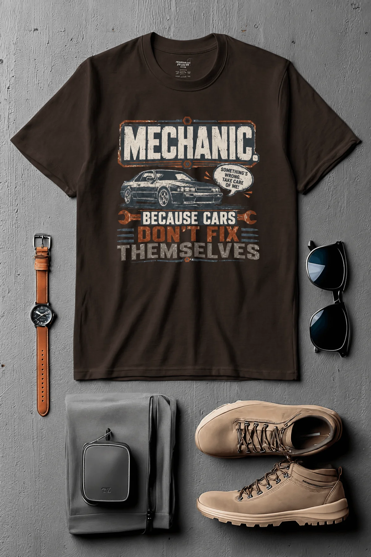 Mechanic Tee — "Mechanic. Because Cars Don't Fix Themselves" Funny Vintage Auto Technician Repair Shirt — brown t-shirt, flat-lay product photo | Pressure Tested Co