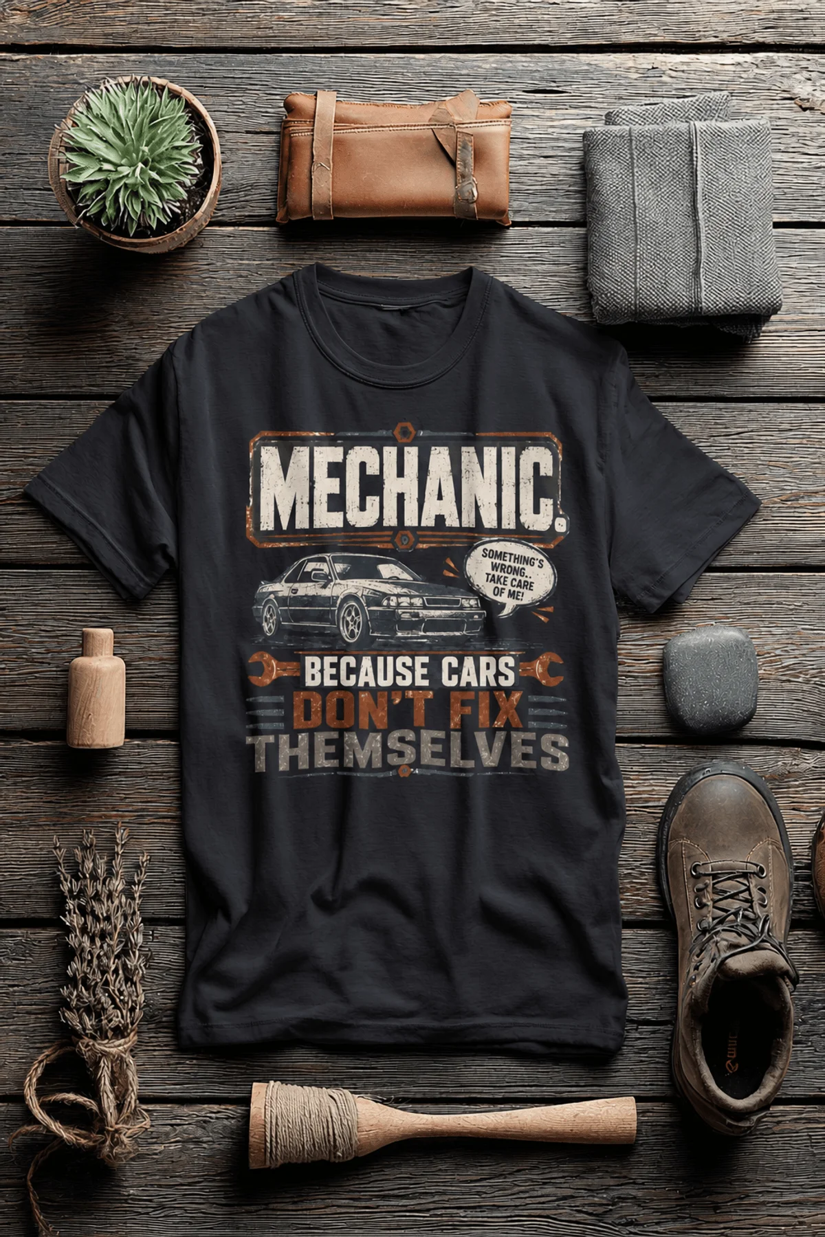 Mechanic Tee — "Mechanic. Because Cars Don't Fix Themselves" Funny Vintage Auto Technician Repair Shirt — dark-grey t-shirt, flat-lay product photo | Pressure Tested Co