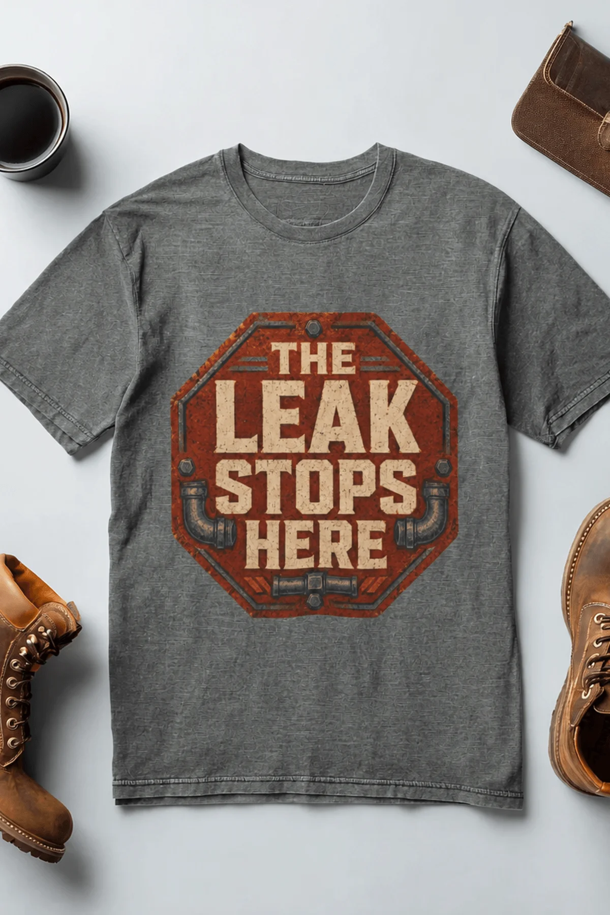 "The Leak Stops Here" Stop Sign Badge Style — Plumbing Repair Tech Humorous Tee — deep-heather t-shirt, flat-lay product photo | Pressure Tested Co