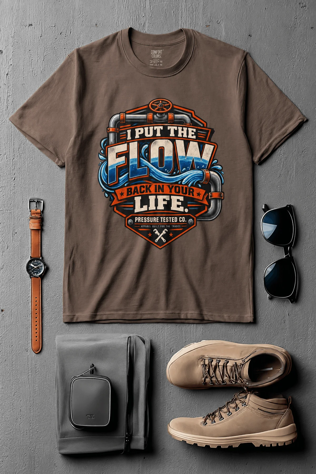 'I Put The Flow Back Into Your Life.' T-Shirt — Funny Retro Industrial Plumber's Tee — espresso t-shirt, flat-lay product photo | Pressure Tested Co