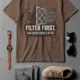 T-Shirt — "Filter First. Ask Questions Later." HVAC Air Filter Graphic — espresso t-shirt, flat-lay product photo | Pressure Tested Co