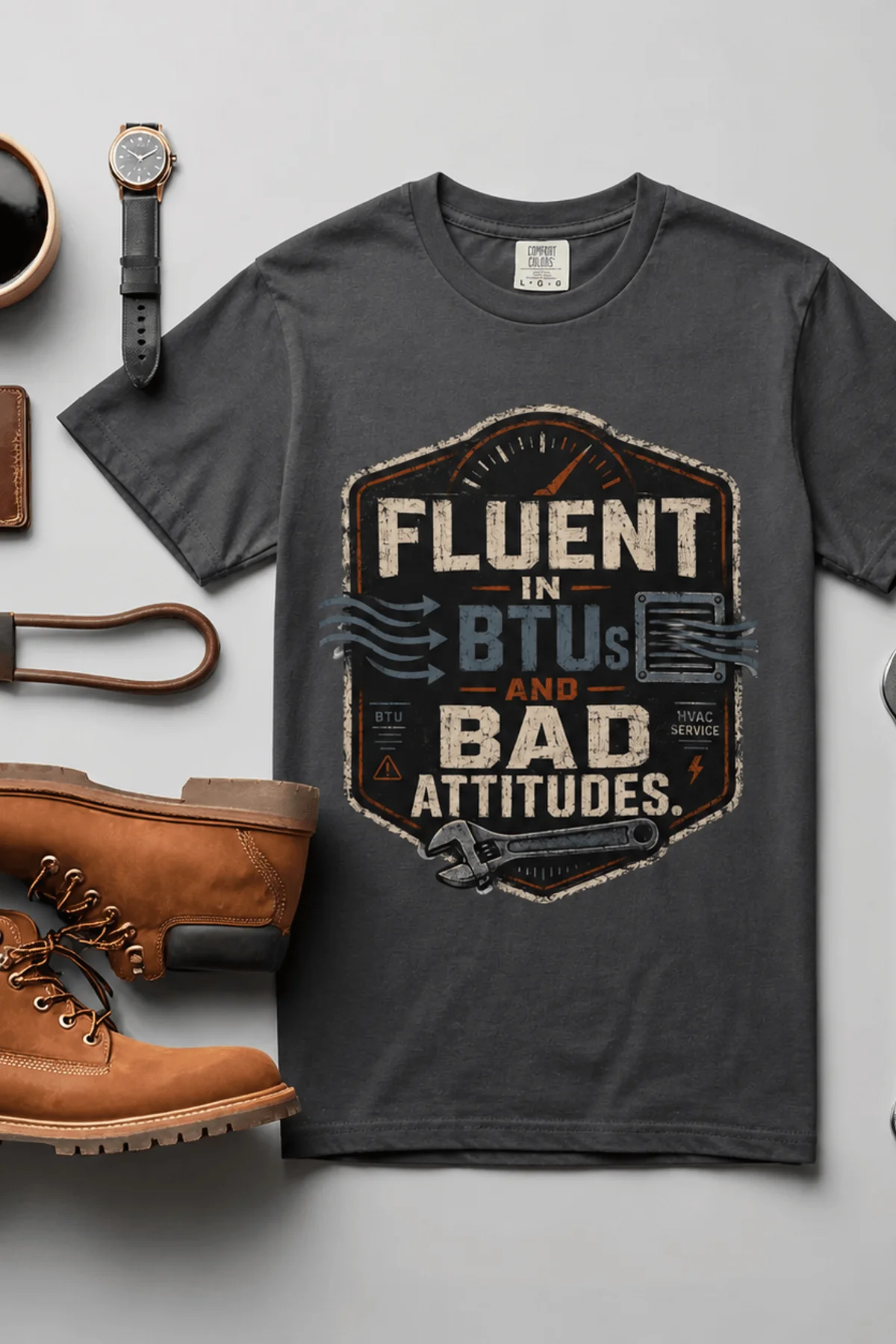 HVAC Tech T‑Shirt – "Fluent In BTUs And Bad Attitudes" — graphite t-shirt, flat-lay product photo | Pressure Tested Co