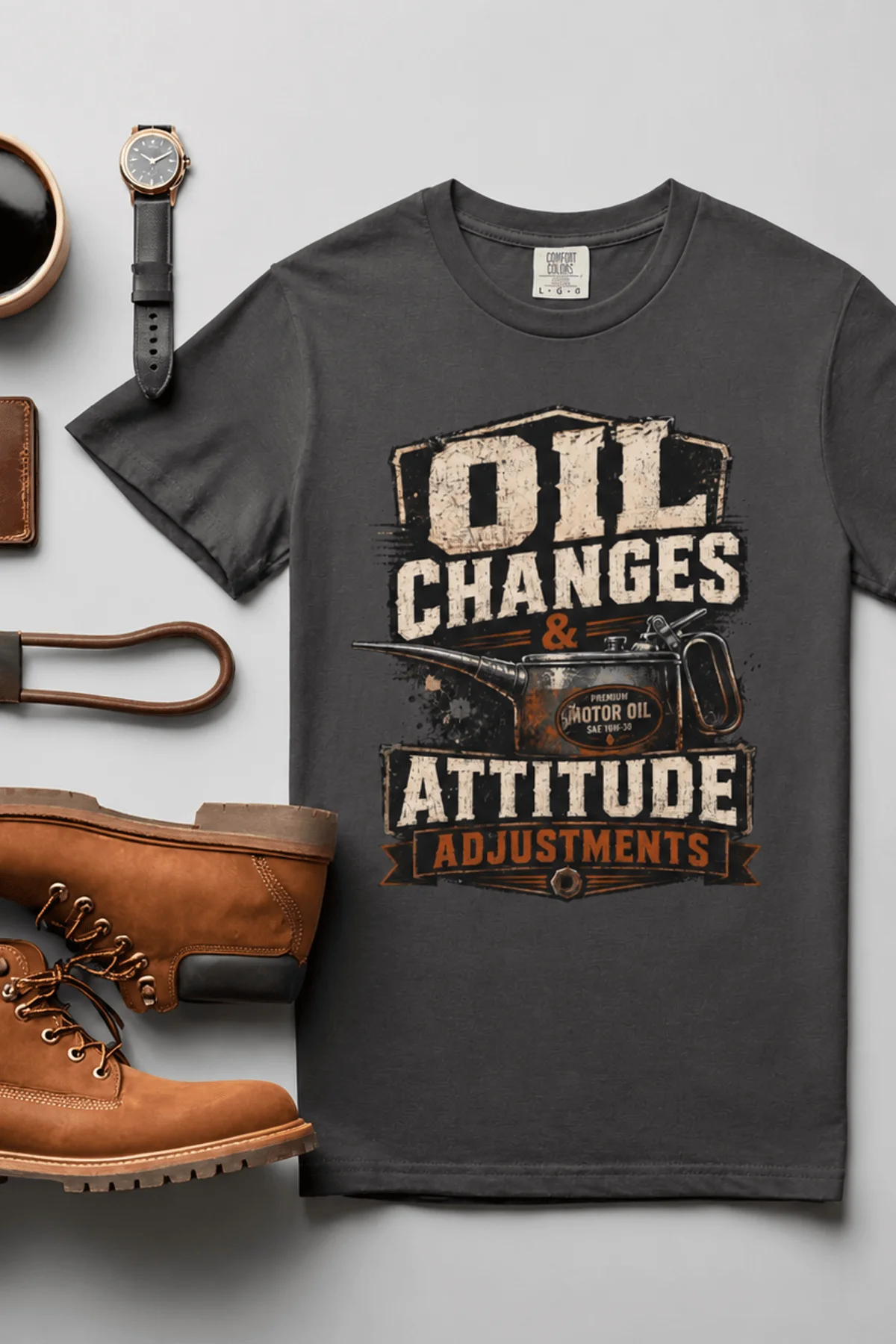 'Oil Changes and Attitude Adjustments' T-Shirt — Funny Retro Industrial Mechanic's Tee — graphite t-shirt, flat-lay product photo | Pressure Tested Co