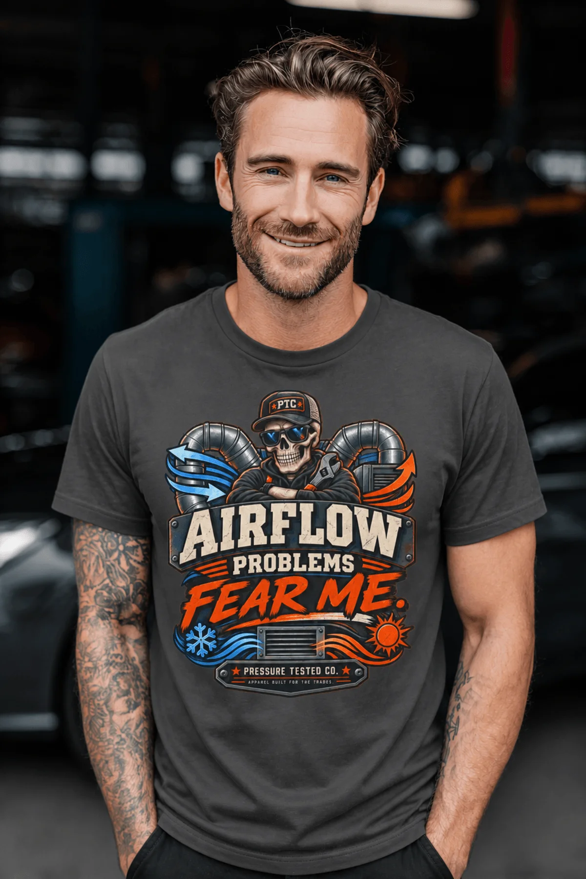 Airflow Problems Fear Me T-Shirt — HVAC Technician Skull Logo Tee — graphite t-shirt, model photo | Pressure Tested Co