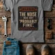 Warning Sign T-Shirt — "The Noise Was Not 'Probably Fine'" Vintage Graphic Tee — grey t-shirt, flat-lay product photo | Pressure Tested Co