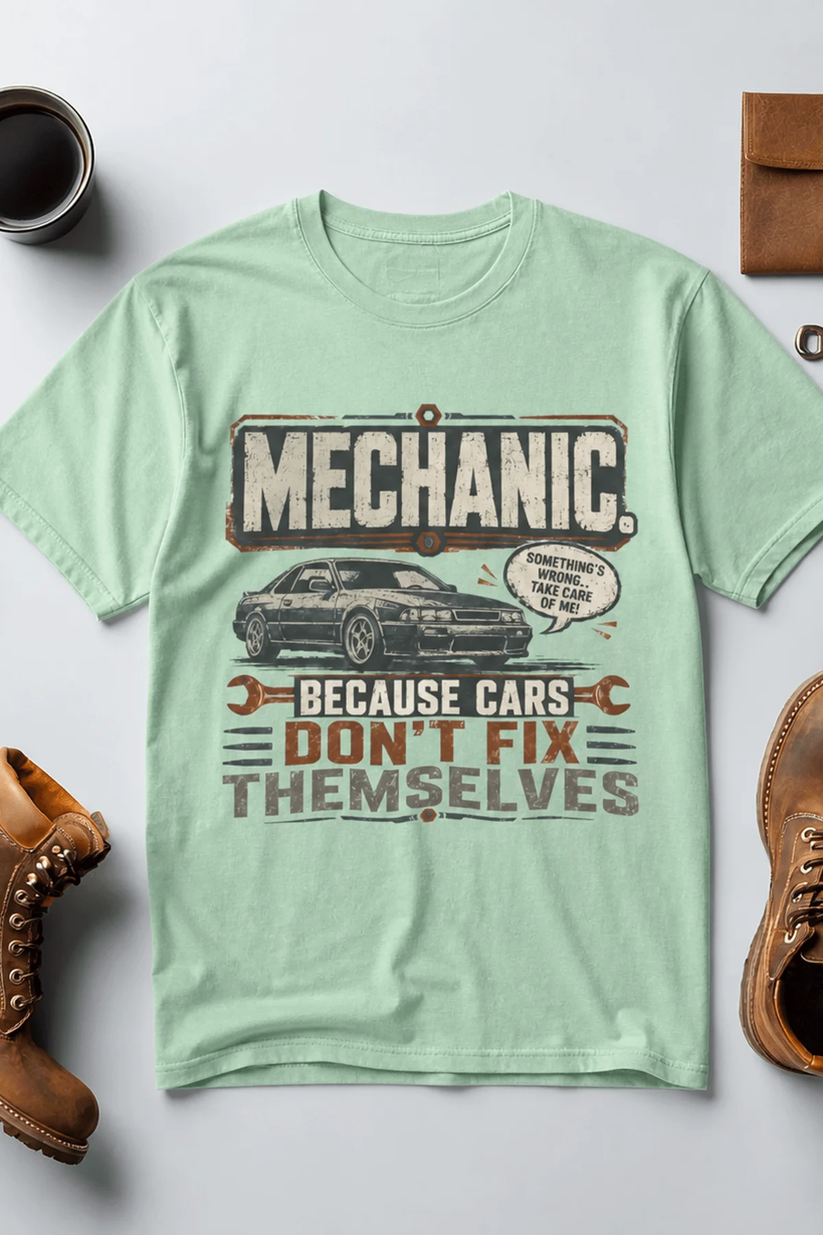 Mechanic Tee — "Mechanic. Because Cars Don't Fix Themselves" Funny Vintage Auto Technician Repair Shirt — heather-mint t-shirt, flat-lay product photo | Pressure Tested Co