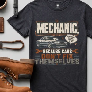 Mechanic Tee — "Mechanic. Because Cars Don't Fix Themselves" Funny Vintage Auto Technician Repair Shirt — heather-navy t-shirt, flat-lay product photo | Pressure Tested Co