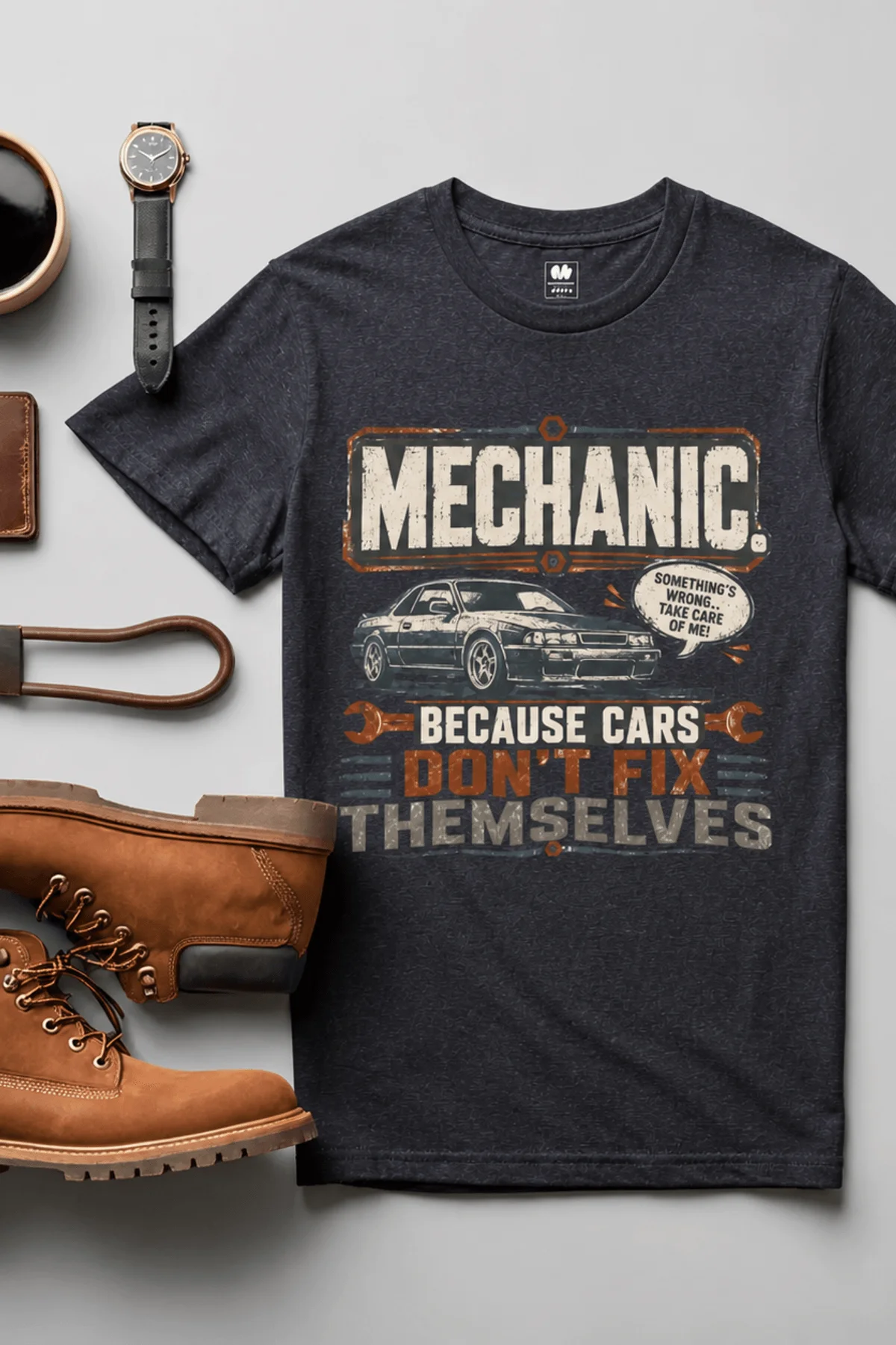 Mechanic Tee — "Mechanic. Because Cars Don't Fix Themselves" Funny Vintage Auto Technician Repair Shirt — heather-navy t-shirt, flat-lay product photo | Pressure Tested Co