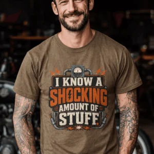 I Know A Shocking Amount Of Stuff T-Shirt — Electrician Science Humorous Tee — heather-olive t-shirt, model photo | Pressure Tested Co