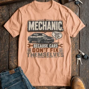 Mechanic Tee — "Mechanic. Because Cars Don't Fix Themselves" Funny Vintage Auto Technician Repair Shirt — heather-peach t-shirt, flat-lay product photo | Pressure Tested Co