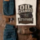 'Oil Changes and Attitude Adjustments' T-Shirt — Funny Retro Industrial Mechanic's Tee — ivory t-shirt, flat-lay product photo | Pressure Tested Co