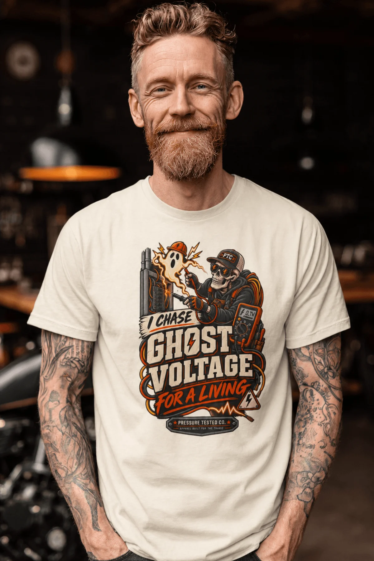 Ghost Voltage T-Shirt — 'I Chase Ghost Voltage for a Living' Vintage Electrician Tee — ivory t-shirt, model photo | Pressure Tested Co