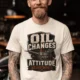 'Oil Changes and Attitude Adjustments' T-Shirt — Funny Retro Industrial Mechanic's Tee — ivory t-shirt, model photo | Pressure Tested Co