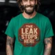 "The Leak Stops Here" Stop Sign Badge Style — Plumbing Repair Tech Humorous Tee — kelly t-shirt, model photo | Pressure Tested Co