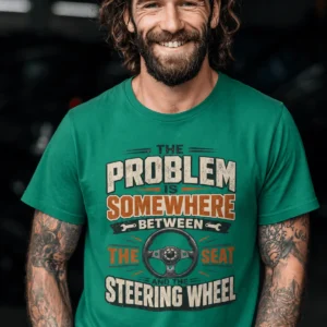Driving Humor T-Shirt — "The Problem Is Somewhere Between The Seat And The Steering Wheel" — kelly t-shirt, model photo | Pressure Tested Co