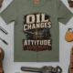 'Oil Changes and Attitude Adjustments' T-Shirt — Funny Retro Industrial Mechanic's Tee — moss t-shirt, flat-lay product photo | Pressure Tested Co