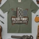 T-Shirt — "Filter First. Ask Questions Later." HVAC Air Filter Graphic — moss t-shirt, flat-lay product photo | Pressure Tested Co