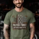T-Shirt — "Filter First. Ask Questions Later." HVAC Air Filter Graphic — moss t-shirt, model photo | Pressure Tested Co