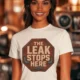 "The Leak Stops Here" Stop Sign Badge Style — Plumbing Repair Tech Humorous Tee — natural t-shirt, model photo | Pressure Tested Co