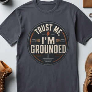 Grounded T‑Shirt – "Trust Me I'm Grounded" Electrical Tech Tee — navy t-shirt, flat-lay product photo | Pressure Tested Co