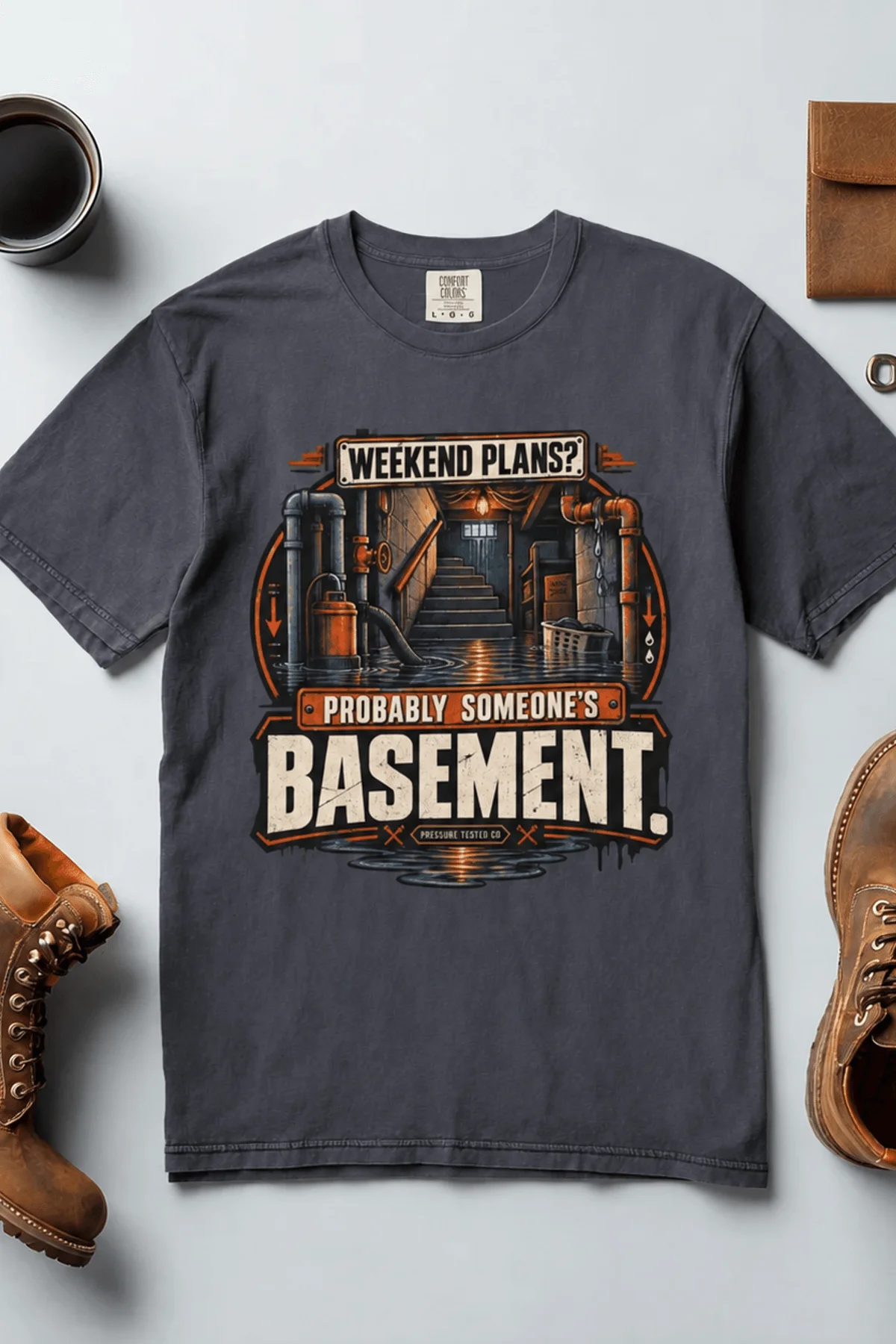 Plumber T‑Shirt – "Weekend Plans? Probably Someone's Basement" Vintage Graphic Design Tee — navy t-shirt, flat-lay product photo | Pressure Tested Co