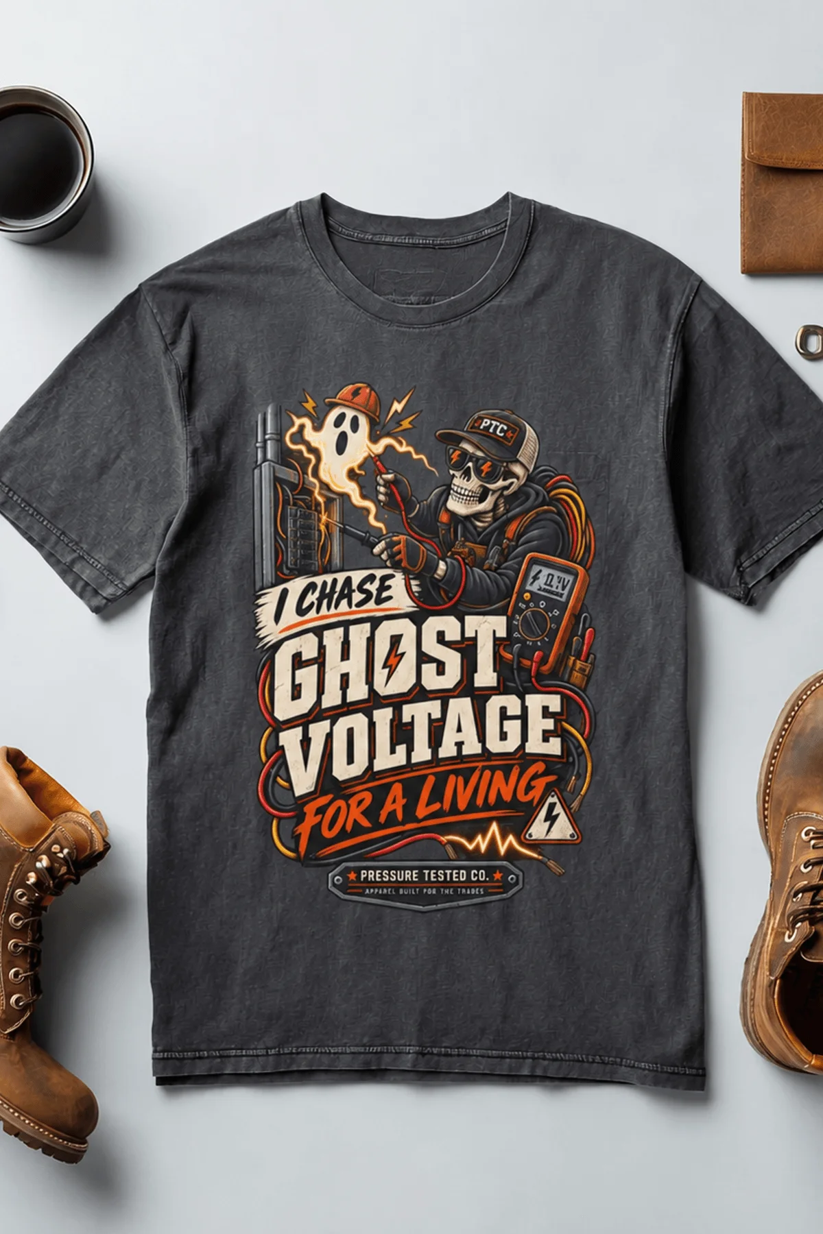 Ghost Voltage T-Shirt — 'I Chase Ghost Voltage for a Living' Vintage Electrician Tee — navy t-shirt, flat-lay product photo | Pressure Tested Co