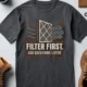 T-Shirt — "Filter First. Ask Questions Later." HVAC Air Filter Graphic — navy t-shirt, flat-lay product photo | Pressure Tested Co