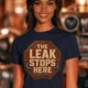 "The Leak Stops Here" Stop Sign Badge Style — Plumbing Repair Tech Humorous Tee — navy t-shirt, model photo | Pressure Tested Co