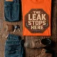 "The Leak Stops Here" Stop Sign Badge Style — Plumbing Repair Tech Humorous Tee — orange t-shirt, flat-lay product photo | Pressure Tested Co
