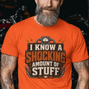 I Know A Shocking Amount Of Stuff T-Shirt — Electrician Science Humorous Tee — orange t-shirt, model photo | Pressure Tested Co