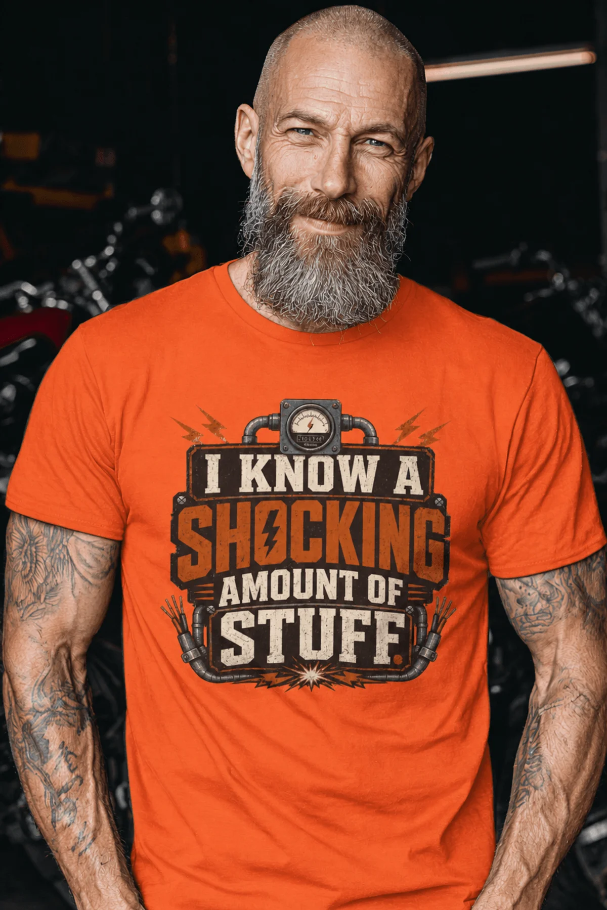 I Know A Shocking Amount Of Stuff T-Shirt — Electrician Science Humorous Tee — orange t-shirt, model photo | Pressure Tested Co