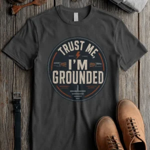 Grounded T‑Shirt – "Trust Me I'm Grounded" Electrical Tech Tee — pepper t-shirt, flat-lay product photo | Pressure Tested Co