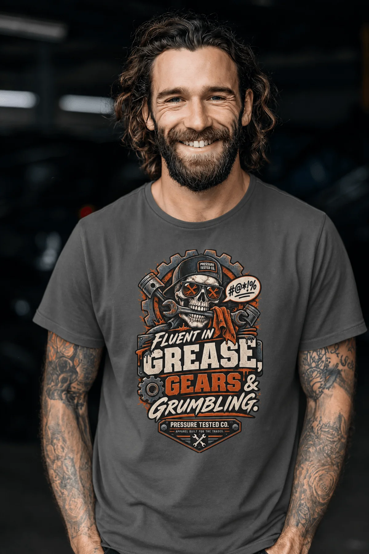 Mechanic Skull T-Shirt — "Fluent in Grease, Gears and Grumbling" Graphic Tee — pepper t-shirt, model photo | Pressure Tested Co