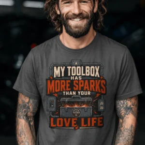 T-Shirt — "My Toolbox Has More Sparks Than Your Love Life" Electrician/Mechanic Workshop Tee — pepper t-shirt, model photo | Pressure Tested Co