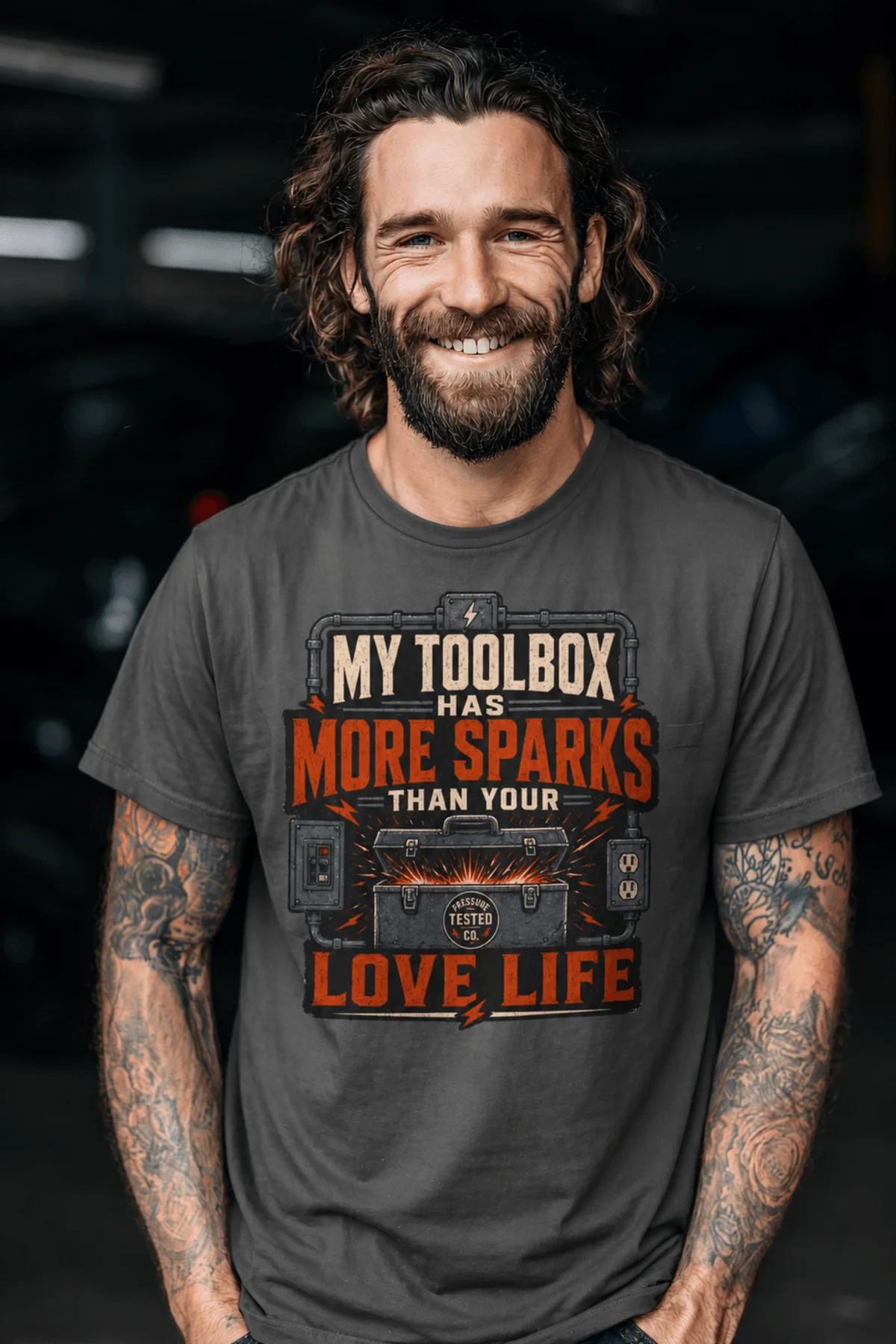 T-Shirt — "My Toolbox Has More Sparks Than Your Love Life" Electrician/Mechanic Workshop Tee — pepper t-shirt, model photo | Pressure Tested Co