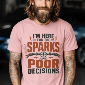 Sparks and Poor Decisions Tee — Funny Electrician/Party Graphic T-Shirt — pink t-shirt, model photo | Pressure Tested Co