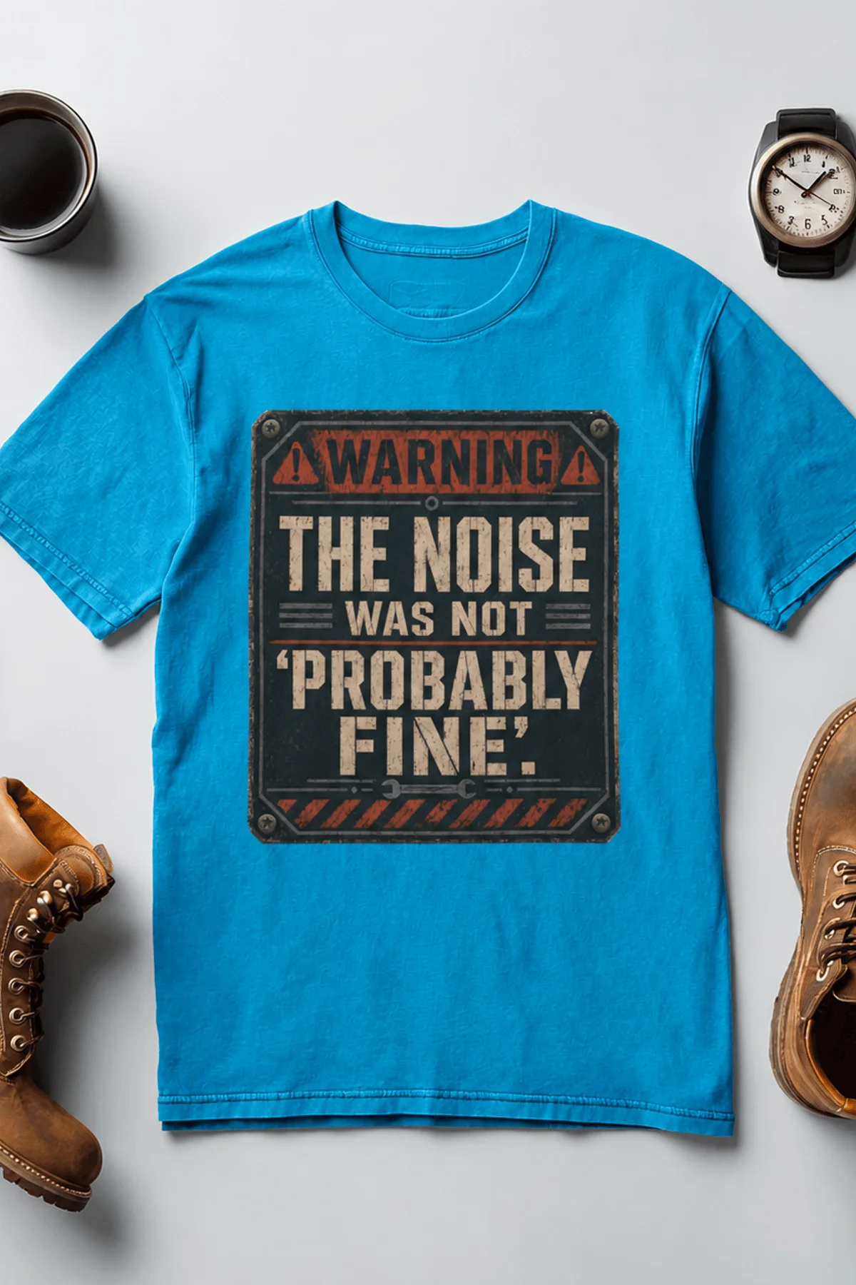 Warning Sign T-Shirt — "The Noise Was Not 'Probably Fine'" Vintage Graphic Tee — sapphire t-shirt, flat-lay product photo | Pressure Tested Co